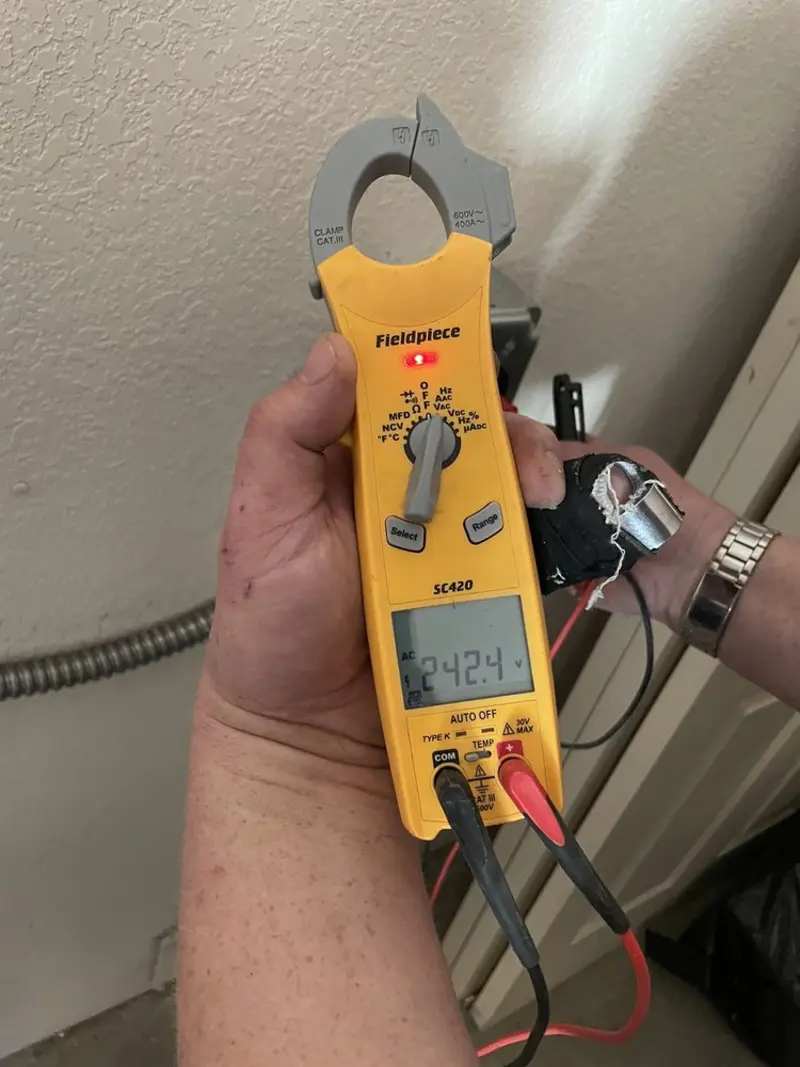 Voltage testing with clamp meter during Electrical Installation Services in Lewes